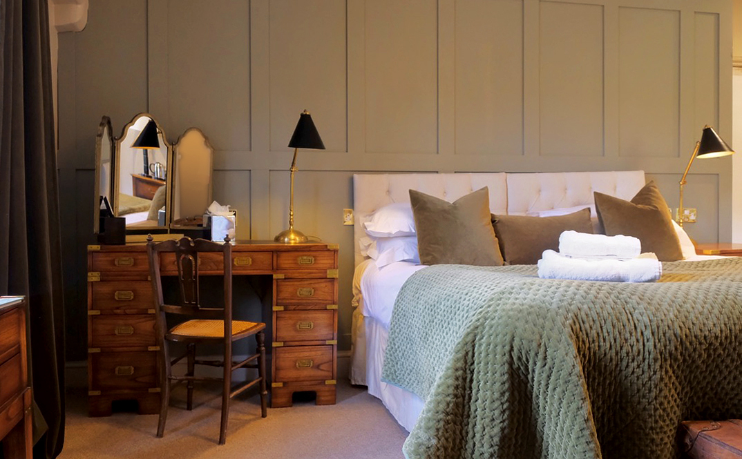 A luxurious bedroom at Simonstone Hall hotel
