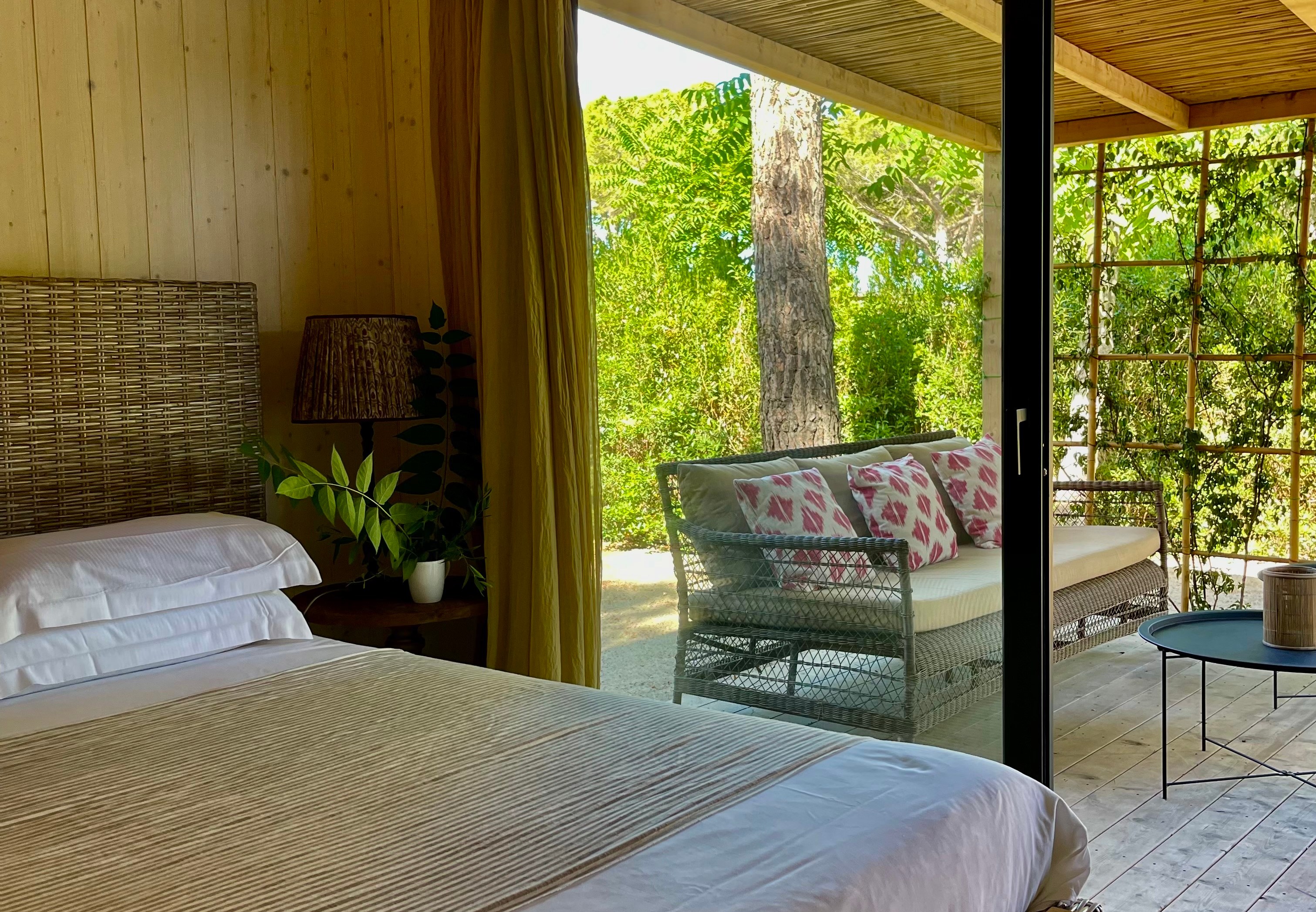 Bedroom with view of outdoor patio.